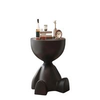 EL GUARDIÁN SENTADO MESA DE ARRIMO ESCULTURAL NEGRO