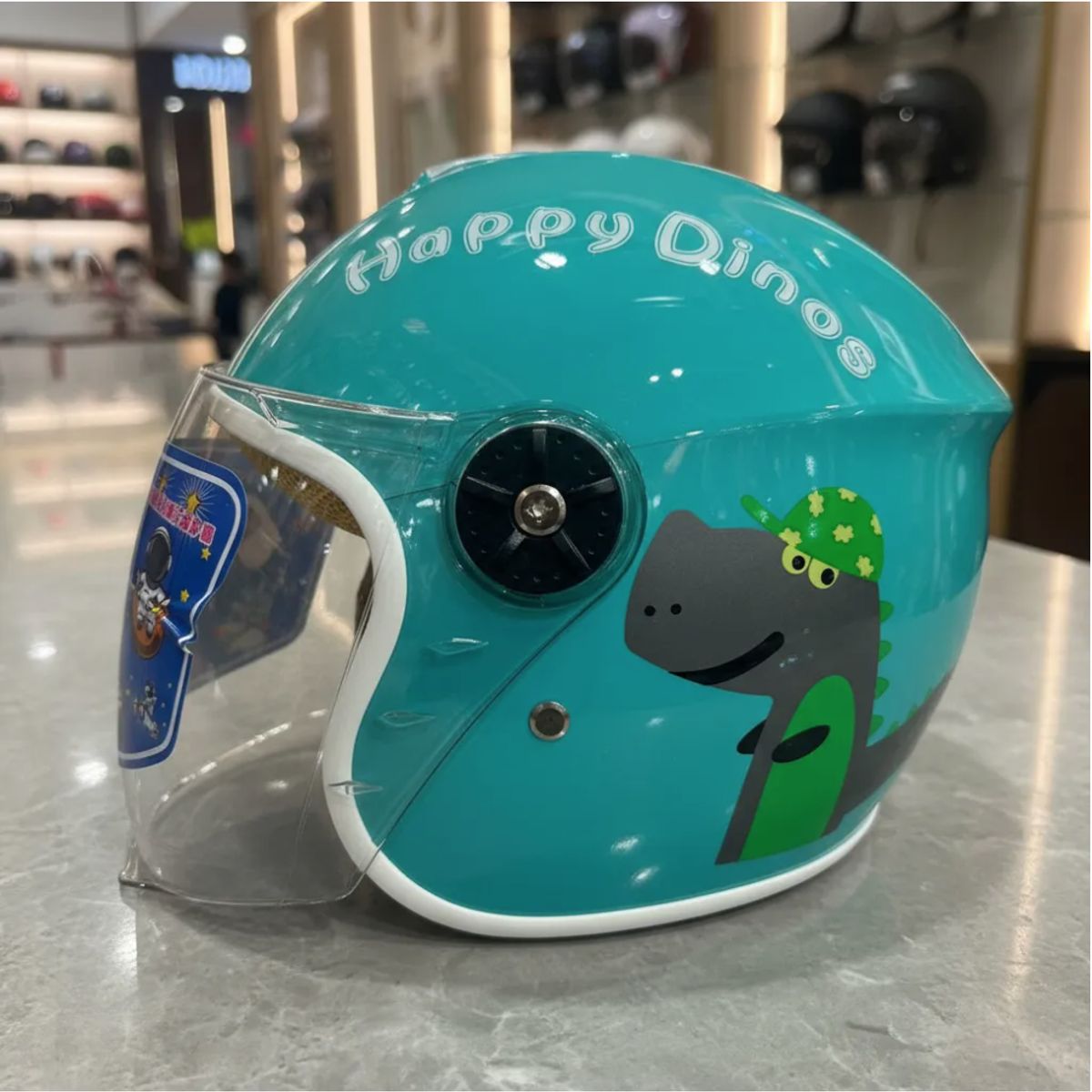 IRM - Casco Abierto Fgn Con Visera Movible Para Niños Celeste Celeste Dinosaurio Brillante S
