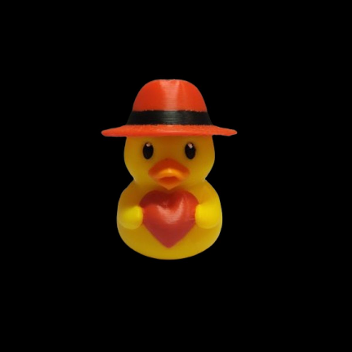 GENERICO - Pato con sombrero sujetando un corazón