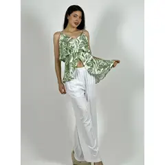 ENIGMATICA BOUTIQUE - Blusa Con Vuelos Diseño Hojas