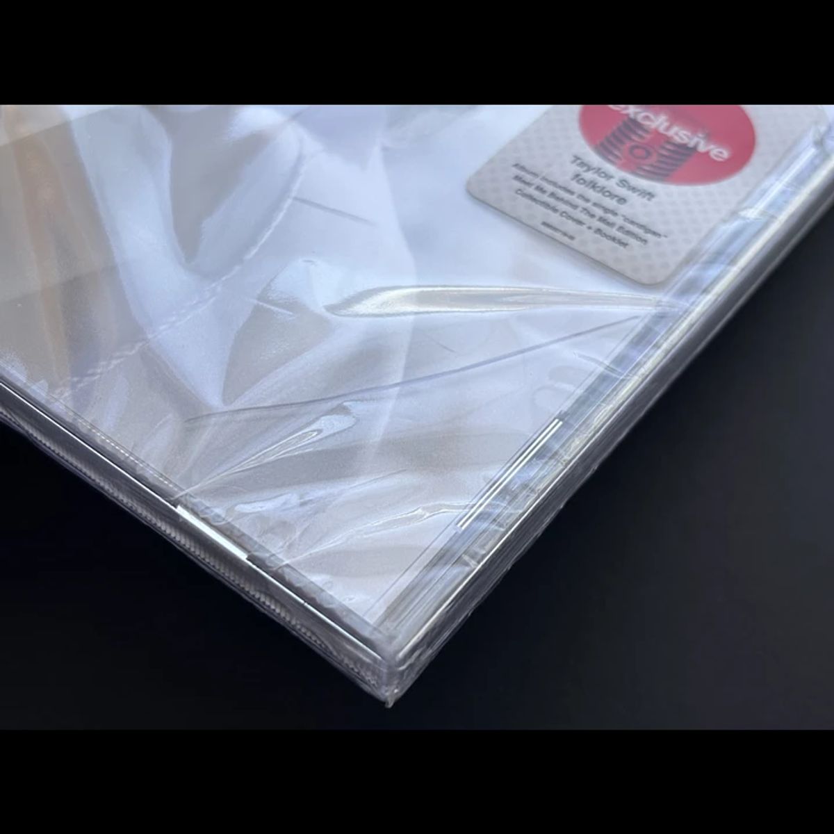 GENERICO - Folklore - Taylor Swift - CD Deluxe Meet Me Behind The Mall con detalle