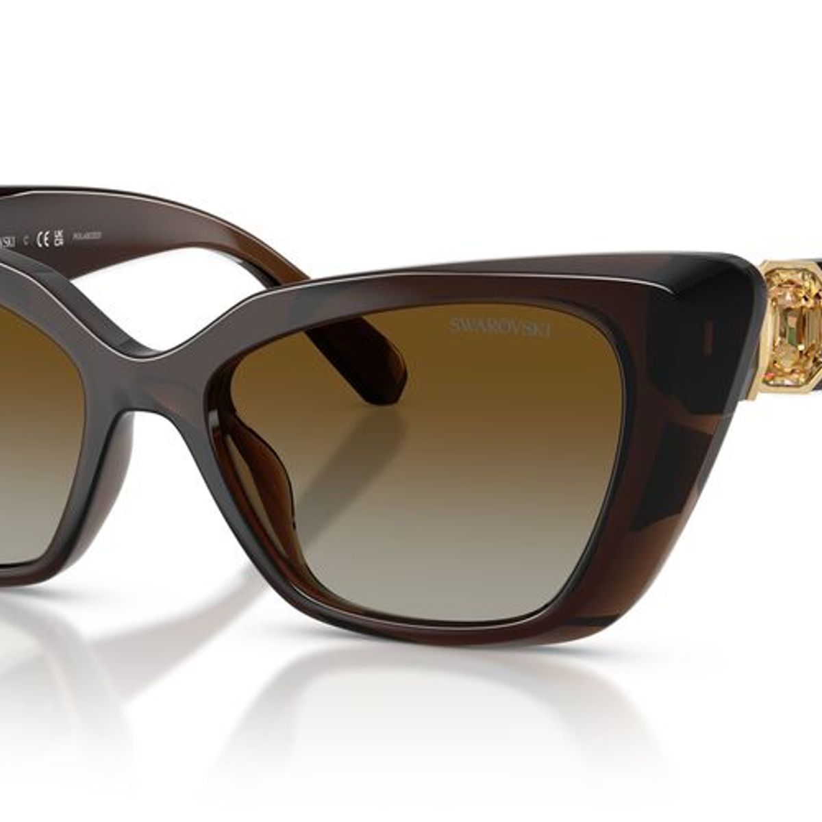 SWAROVSKI - Anteojos De Sol Swarovski SK6047 Transparent Brown Polar Brown Gradient Café Mujer