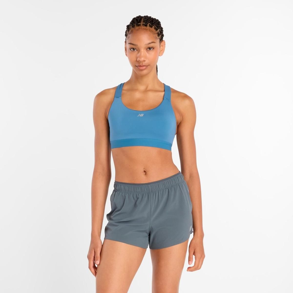 NEW BALANCE - Peto Entrenamiento Mujer New Balance Essential Celeste