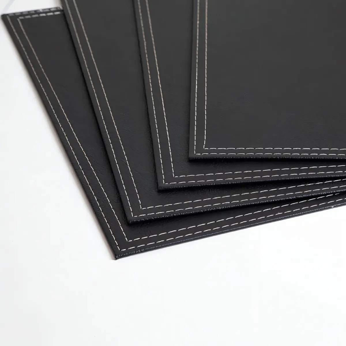 DORAL - Set 4 Individuales Rectangular Ecocuero 42x32cm Negro