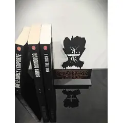 GENERICO - Sujetalibros- Extraño