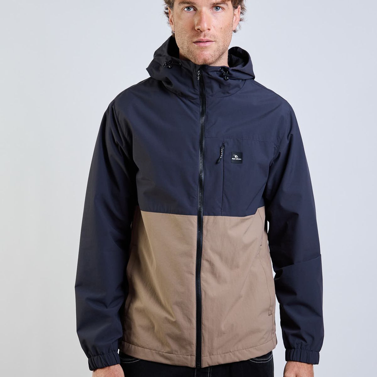 RIP CURL - Cortaviento Flow Café Hombre Rip Curl