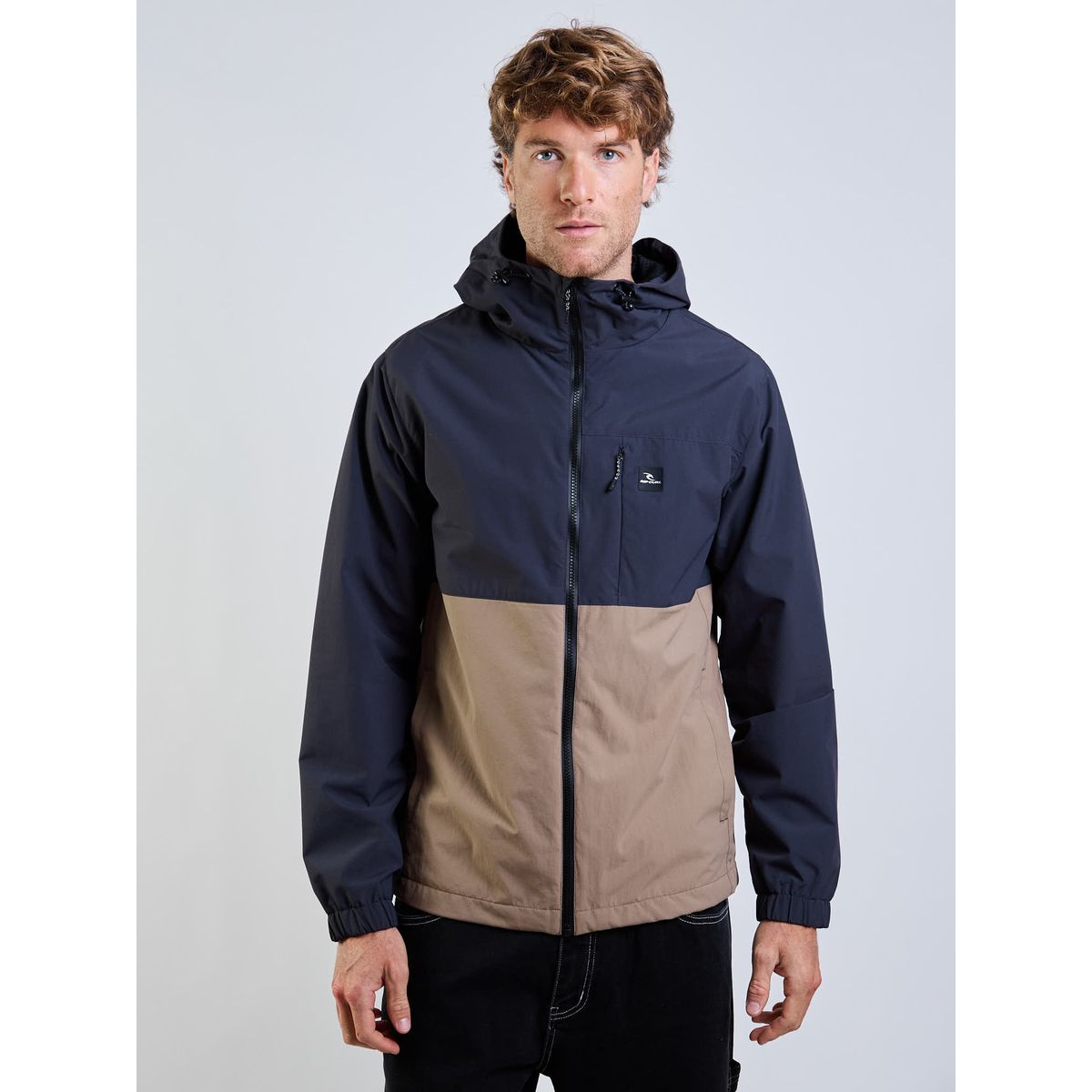 RIP CURL - Cortaviento Flow Café Hombre Rip Curl