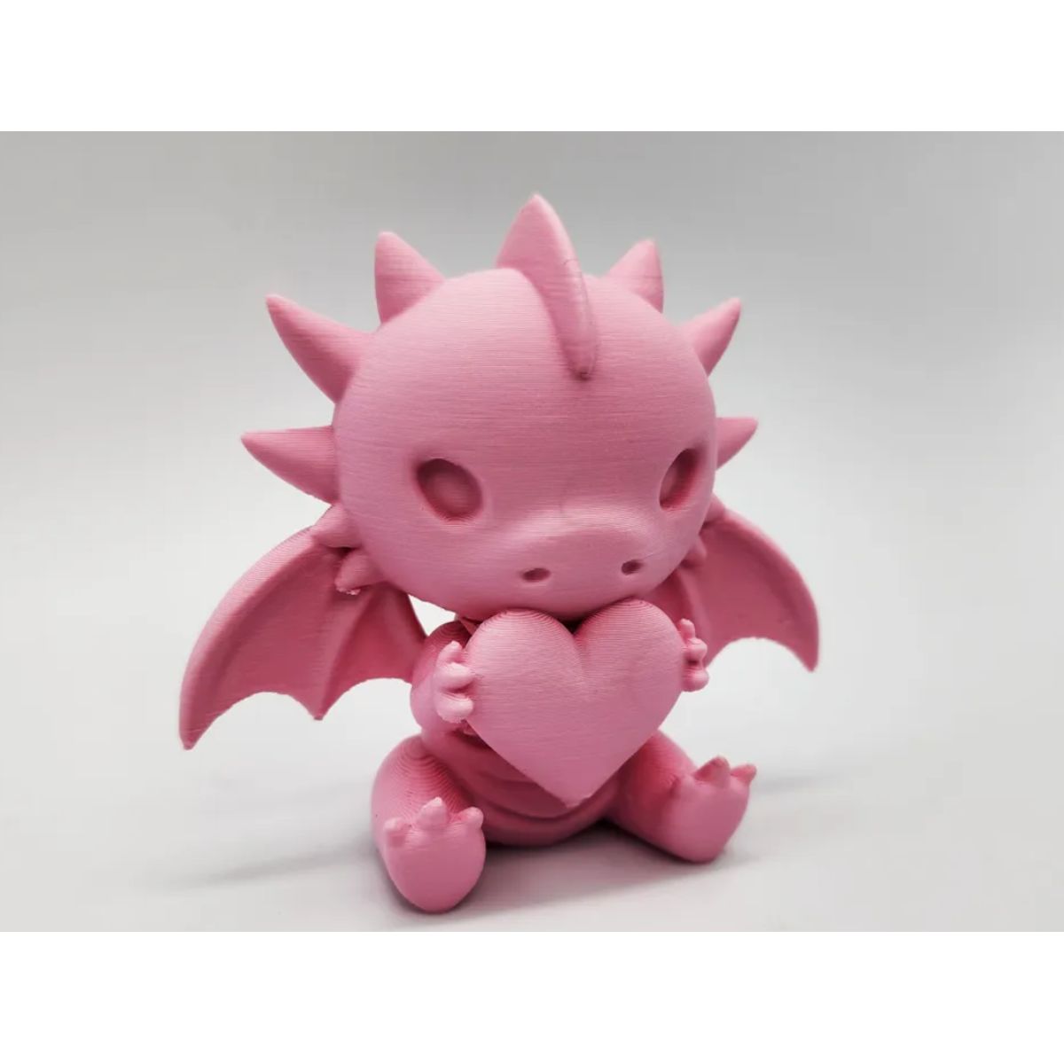 GENERICO - Figura decorativa - Dragón con corazón