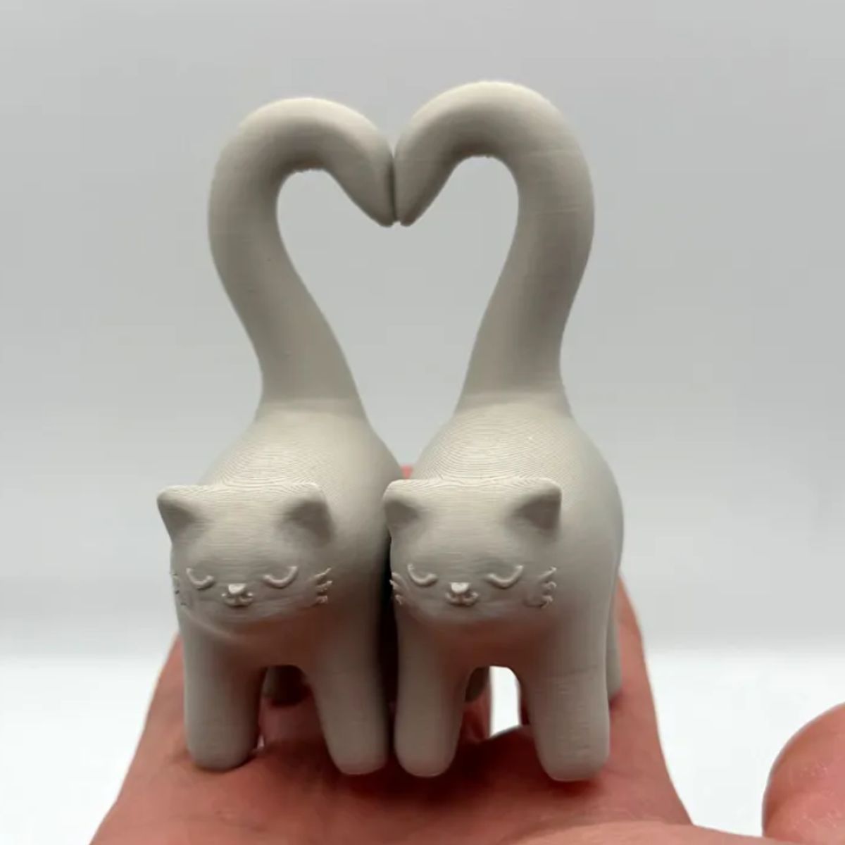 GENERICO - Figura decorativa - Gatitos con cola corazón