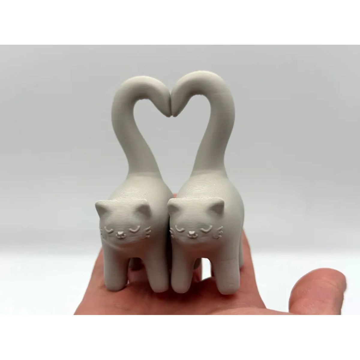 GENERICO - Figura decorativa - Gatitos con cola corazón