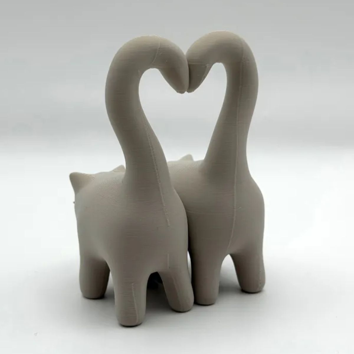 GENERICO - Figura decorativa - Gatitos con cola corazón