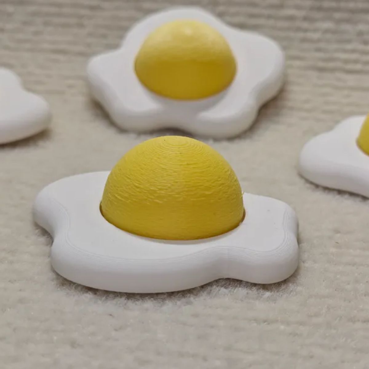 GENERICO - Figura clicker forma huevo frito