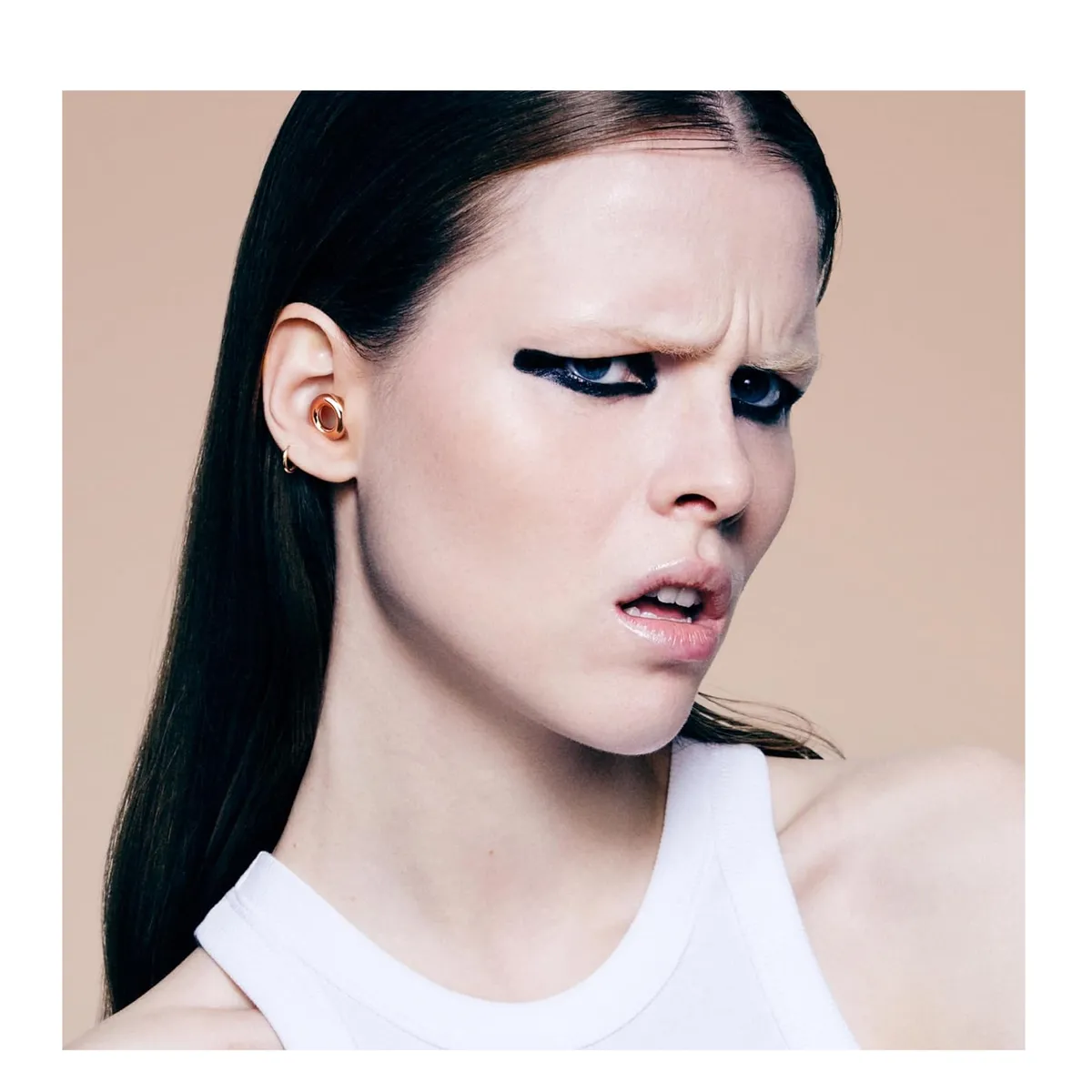 LOOP - Tapones LOOP para los oídos elegante protección auditiva en eventos ORO ROSA