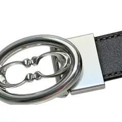 COACH - Cinturón Reversible NegroCafé con Hebilla Plateada