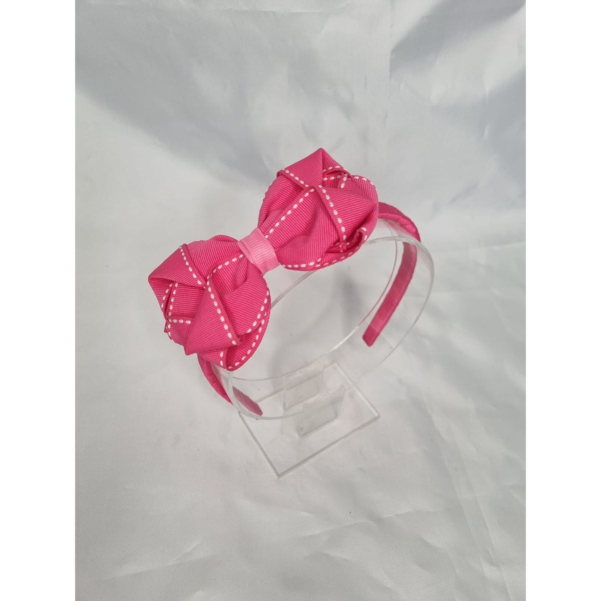 EL ESPACIO DE TOMMY - Cintillo niña fucsia con lazo fucsia lineas blancas