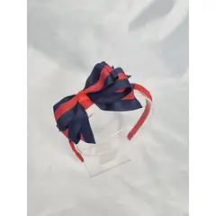 EL ESPACIO DE TOMMY - Cintillo niña rojo con lazo azul marino 2