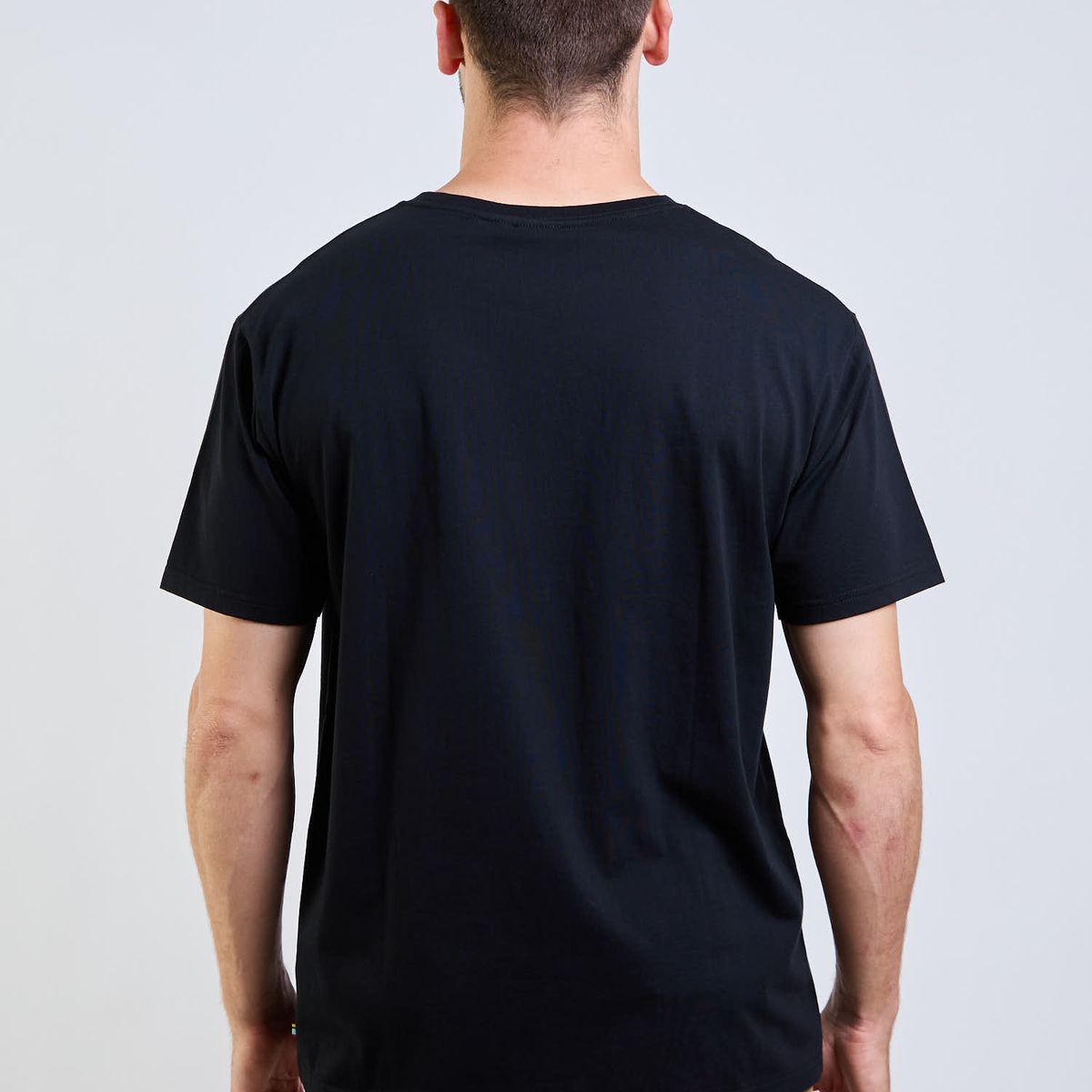 RUSTY - Polera MC Tiny R Logo Negro Hombre Rusty
