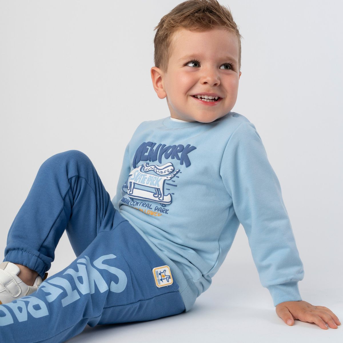 4KIDS - Buzo bebé skate celeste 4 Kids