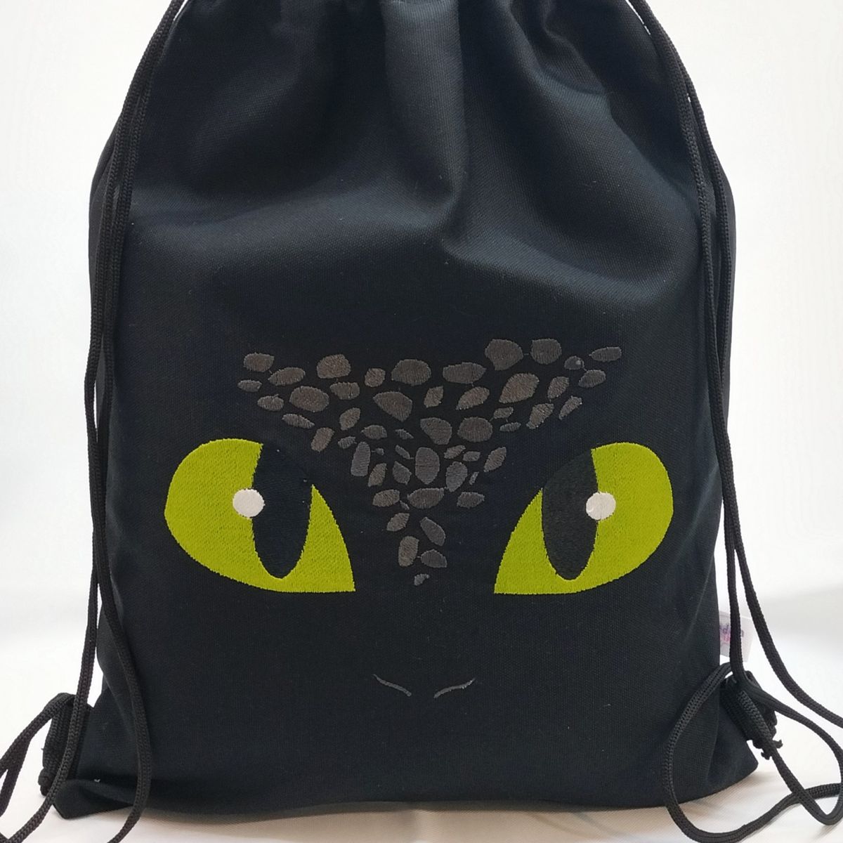 GENERICO - Bolso morral Chimuelo Bordado Lona