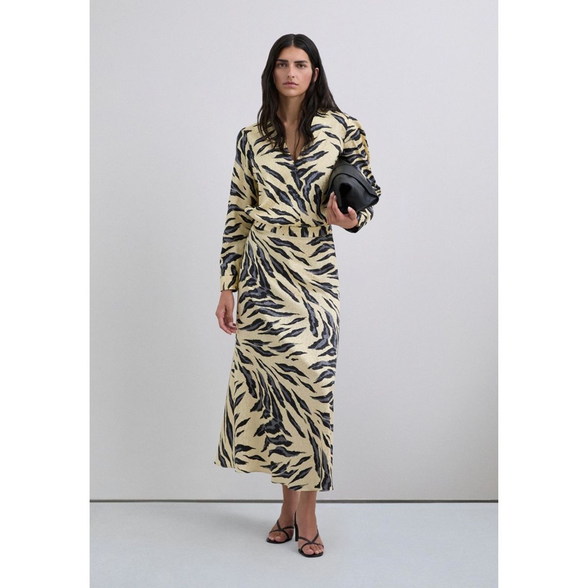 SCALPERS - Falda Midi Animal Print