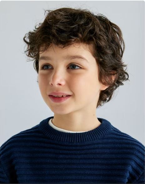 Chaleco con 2 puntos distintos en el tejido, con cuello redondo, hermoso diseno, buen calce, tejido grueso. Azul Marino 10 ANOS