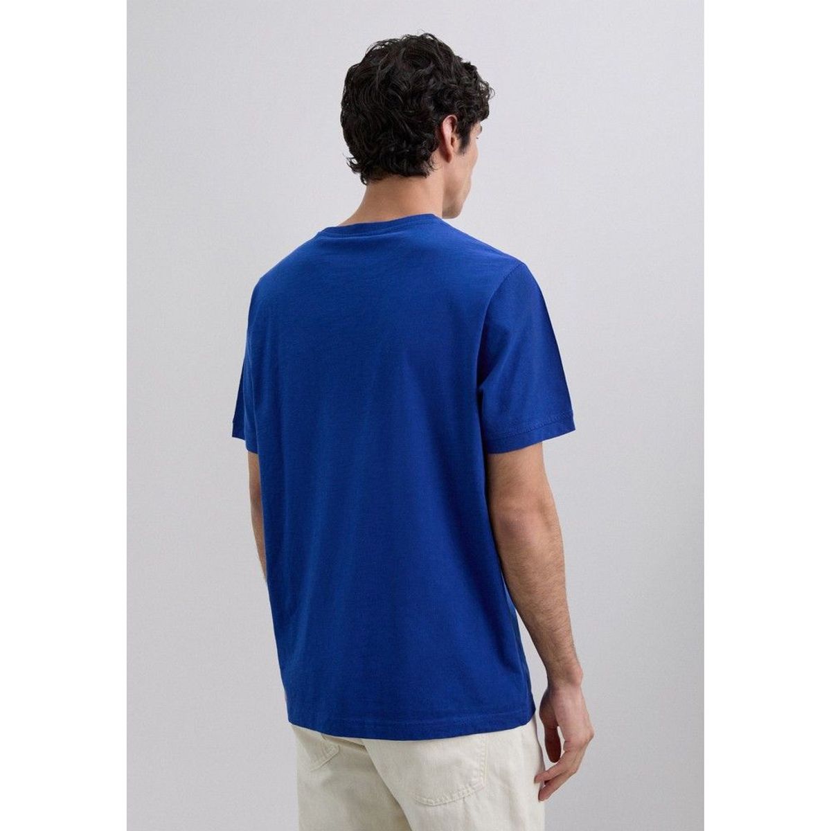 SCALPERS - Polera Bordada Efecto Lavado
