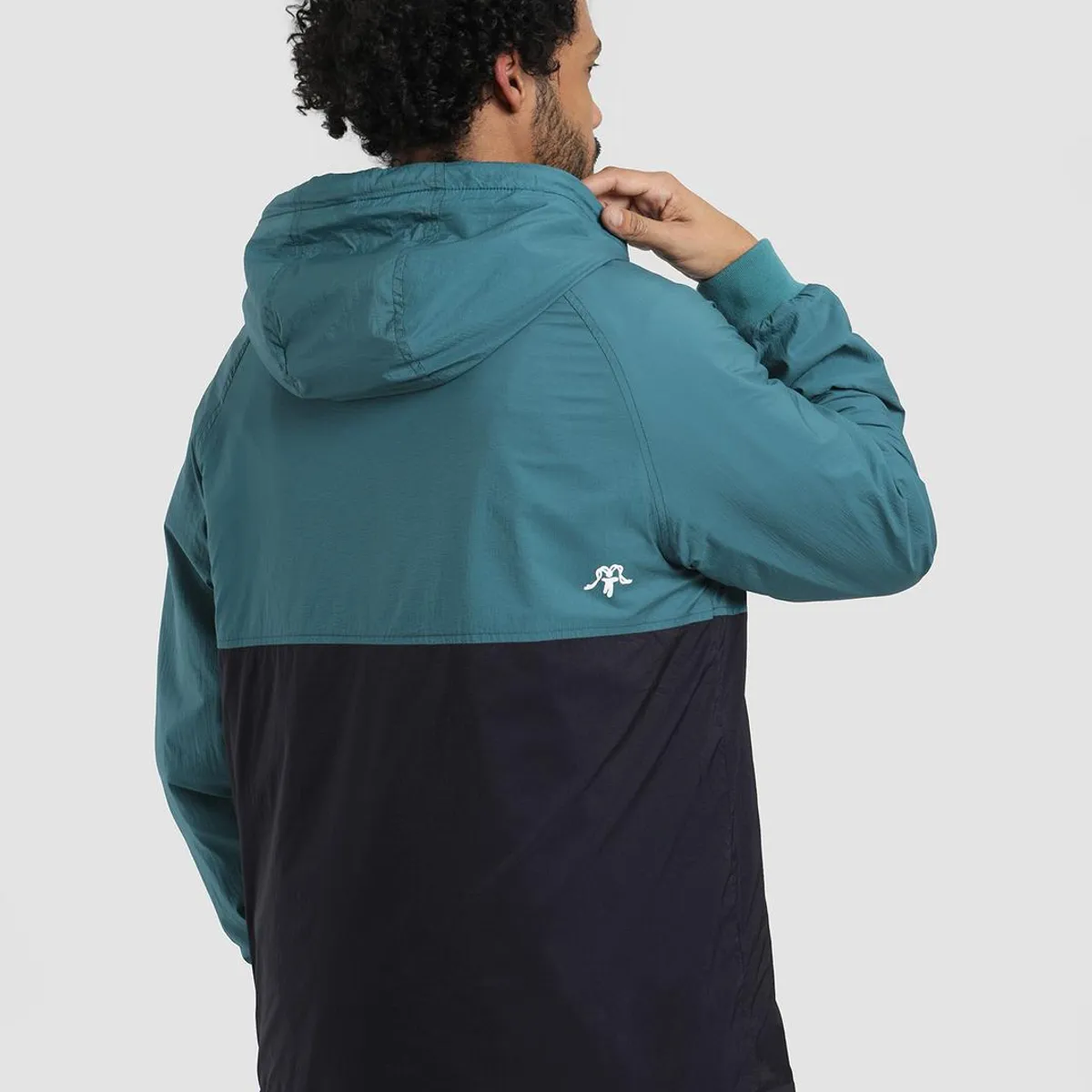 KAYA UNITE - Chaqueta Cortaviento Surazo Hood Hombre Petrol