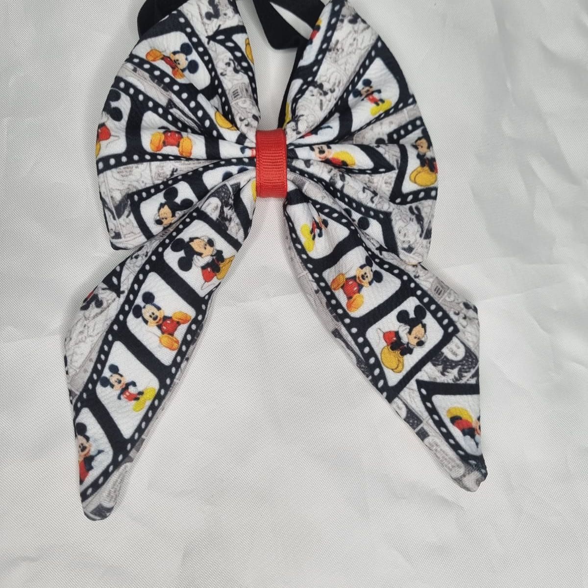 EL MUNDO DE EMMA - Corbatín mascota animado negro