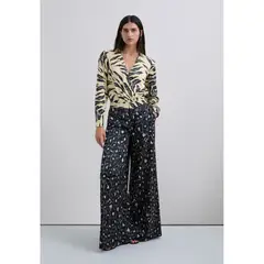 SCALPERS - Pantalón Fluido Animal Print