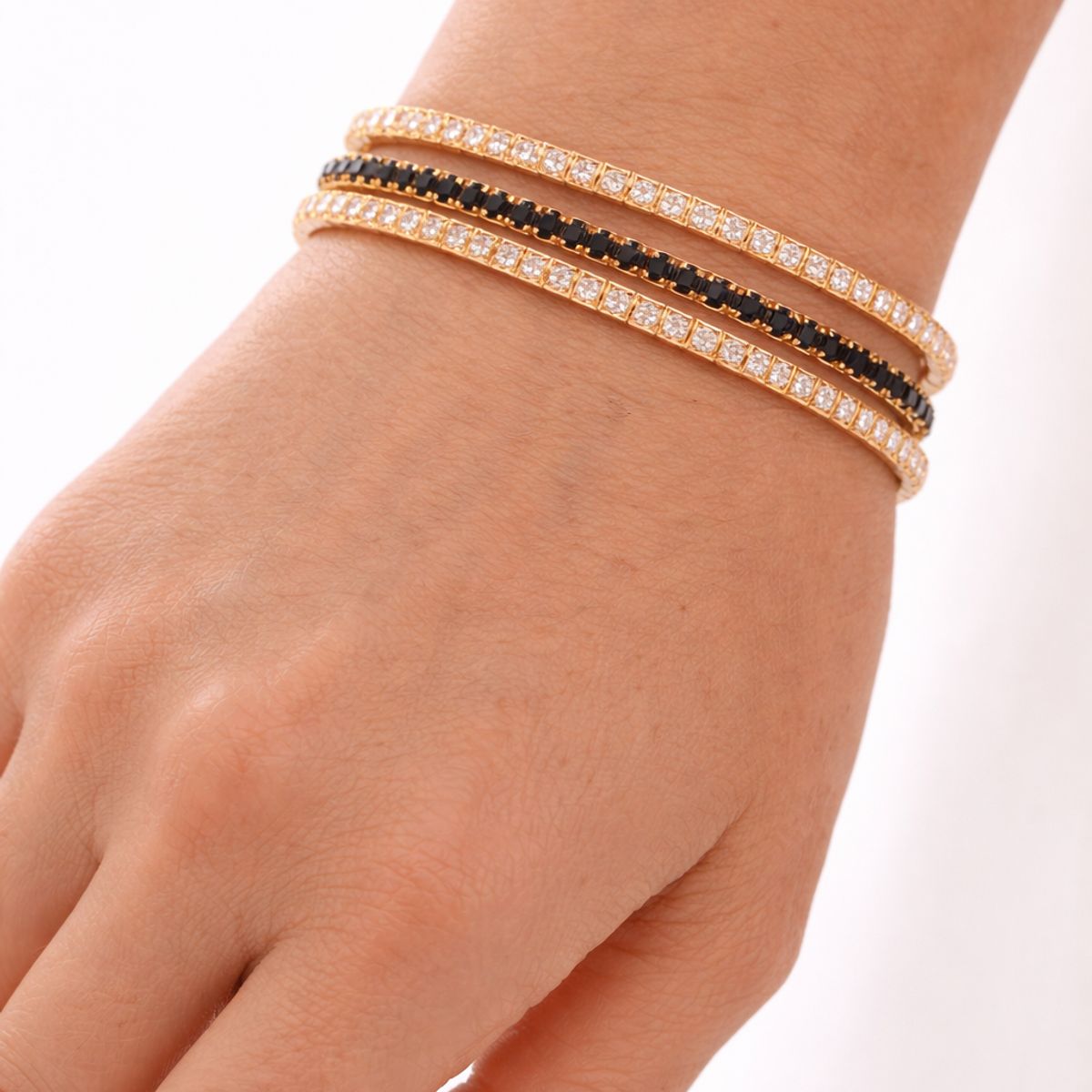 GENERICO - Set 3 Pulseras en Strass elásticadas en dorado y negro