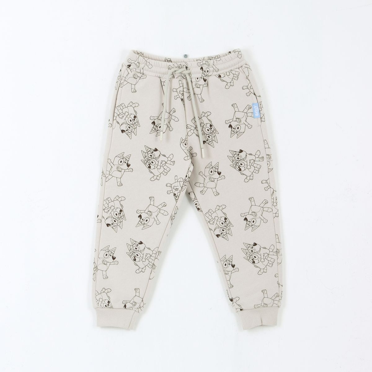BLUEY - Pantalón de Buzo Niño Full Print Lineal Beige Bluey