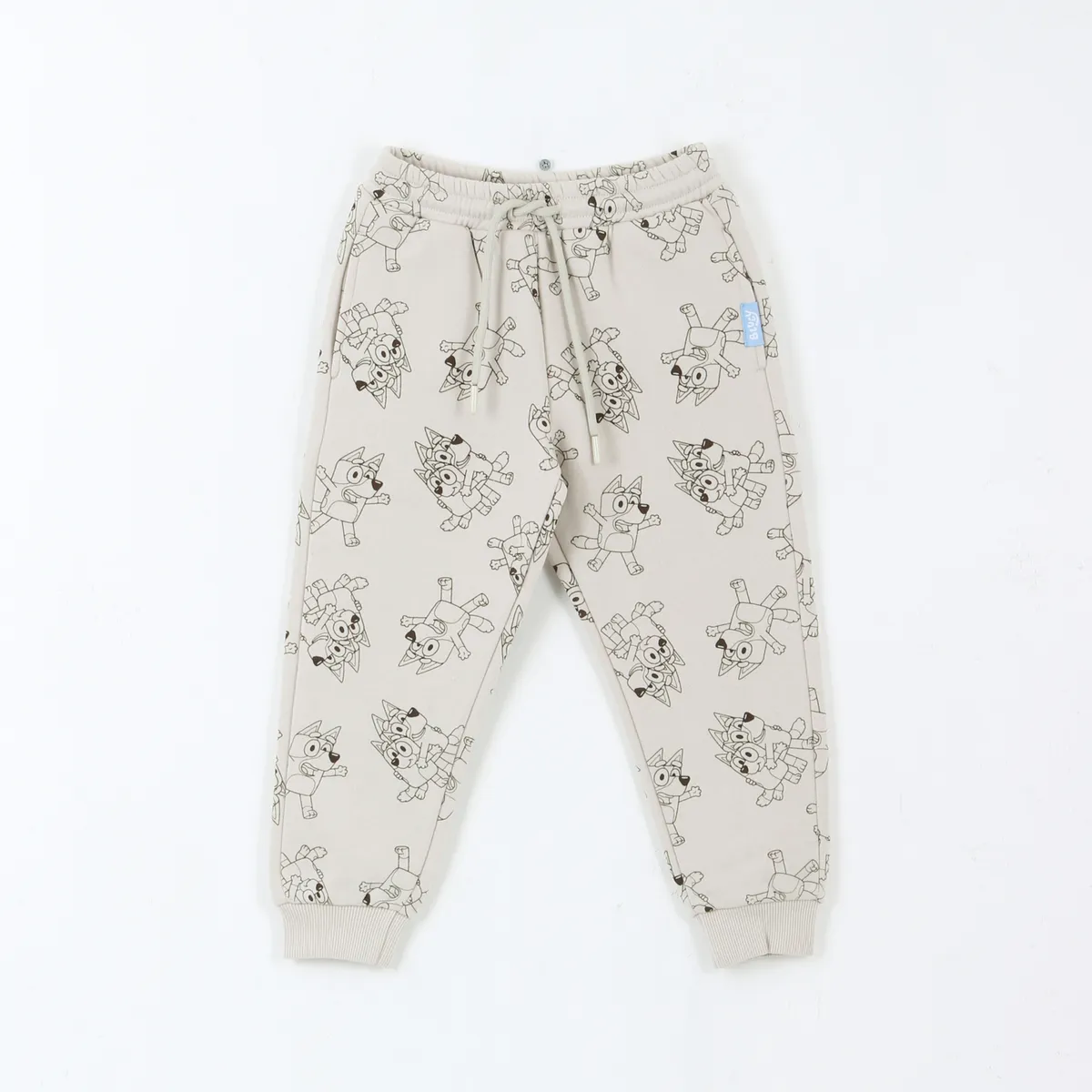 BLUEY - Pantalón de Buzo Niño Full Print Lineal Beige Bluey