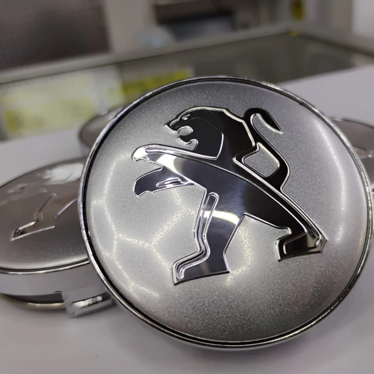 GENERICO - Tapa centro Llantas de autos 56mm universal PEUGEOT PLATA