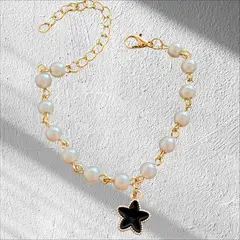 GENERICO - Pulsera dorada con perlas y dije estrella negra Acero inoxidable Cafuné Studio