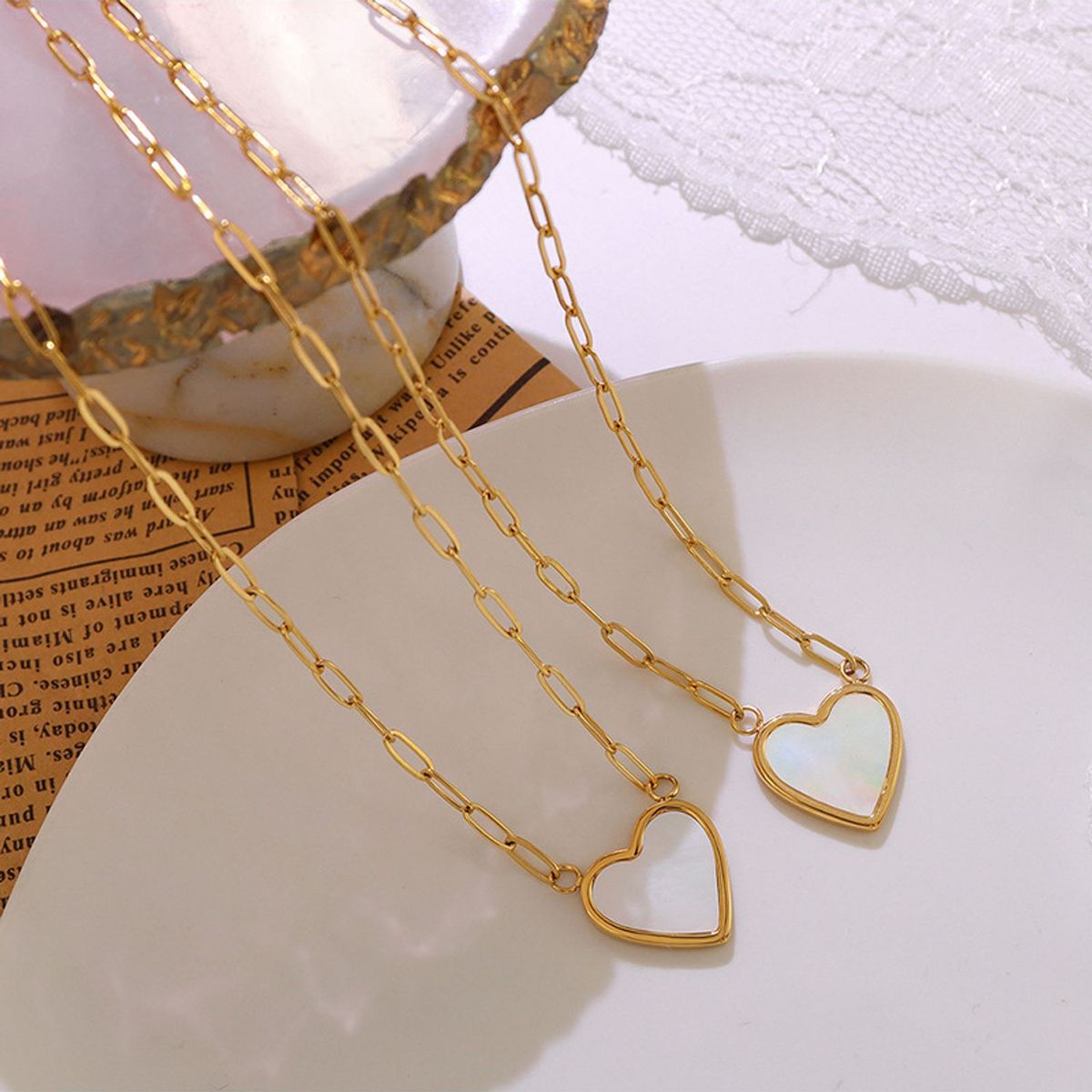 TIOZONEY - Collar con colgante de corazón chapado