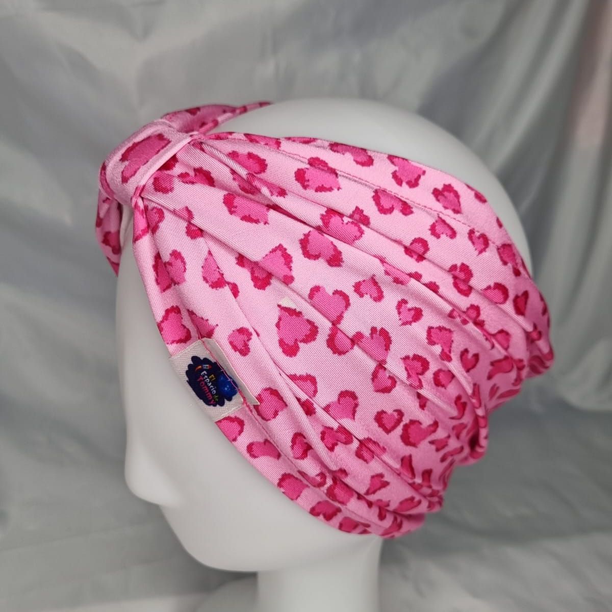 EL ESPACIO DE TOMMY - Turbante cintillo clínico lycra corazones fucsia