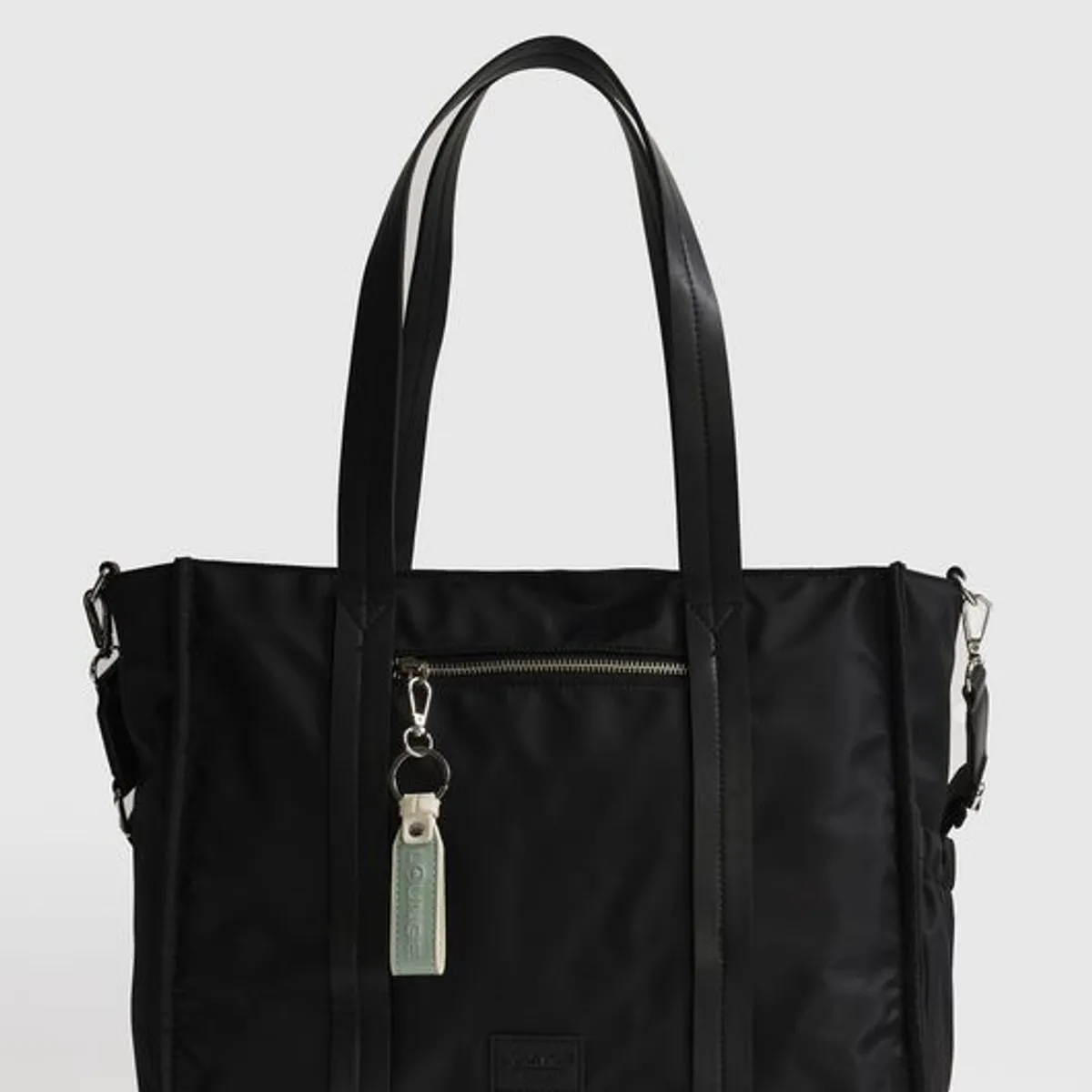 LOUNGE - Bolso Nylon Notebook Llavero Icónicas LOUNGE