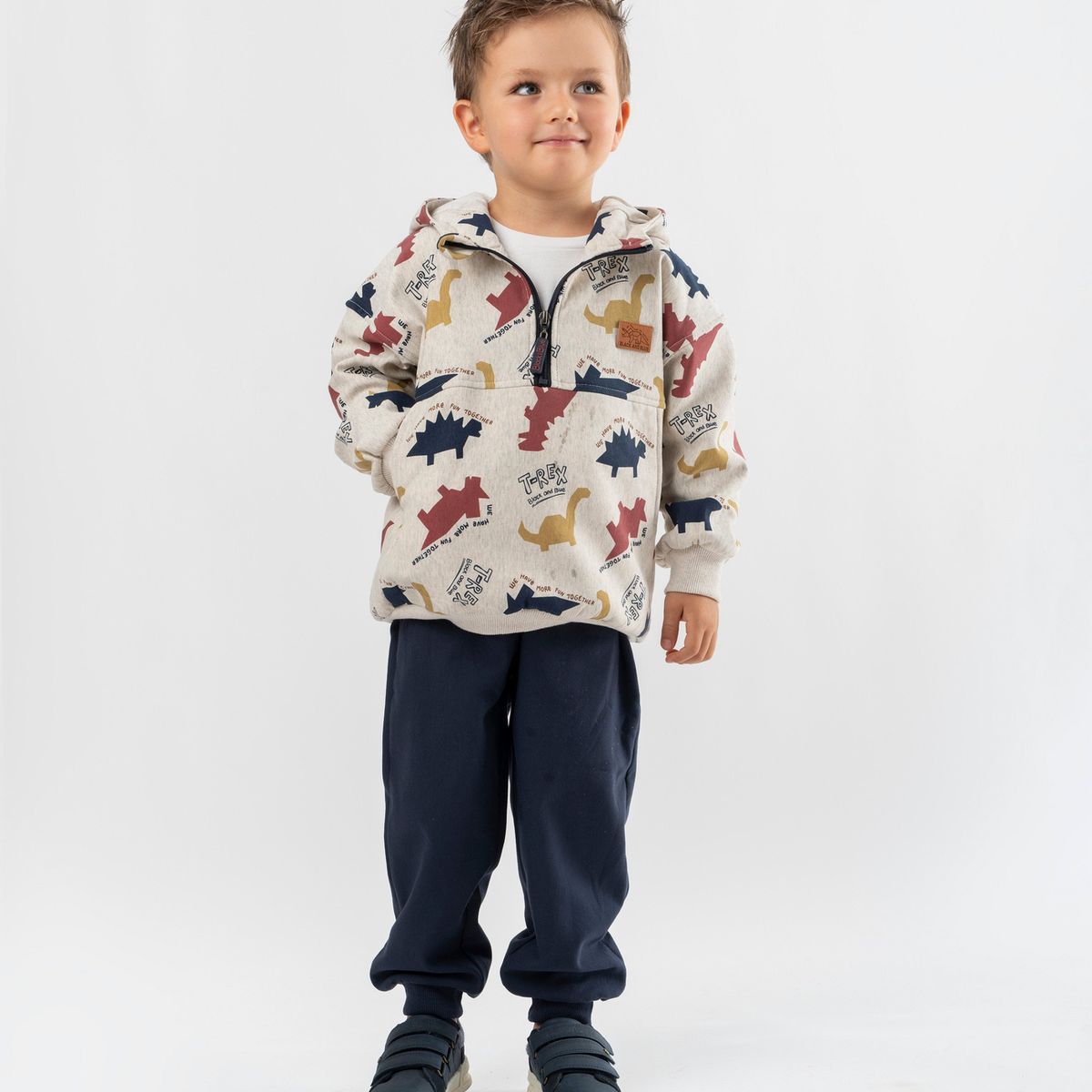BLACK AND BLUE - Buzo niño con dinosaurios crudo Black and blue