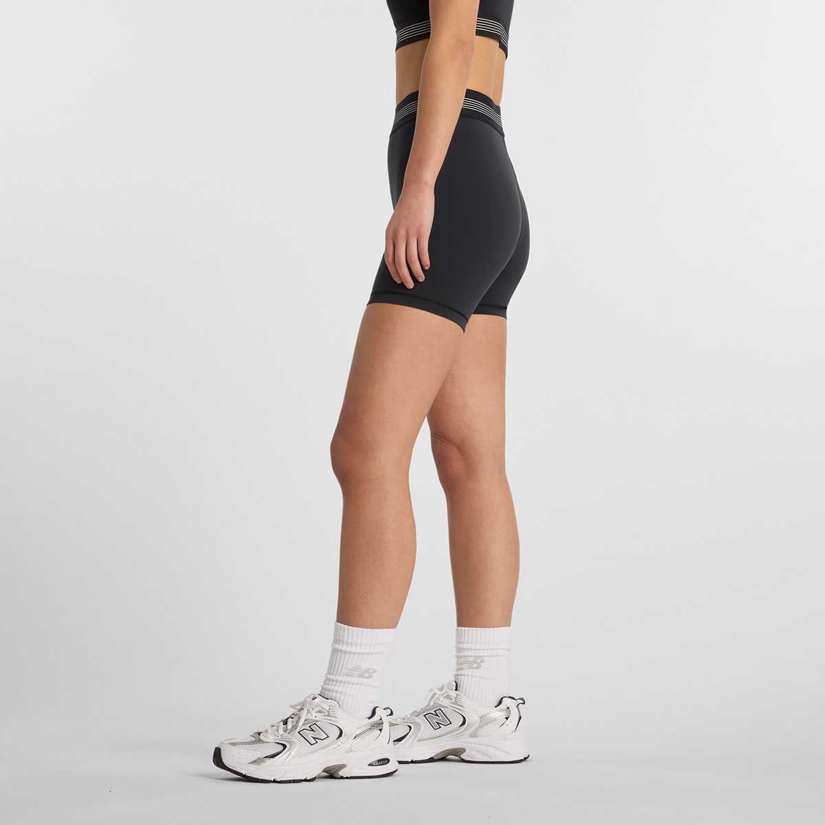 NEW BALANCE - Calza Corta Running Mujer New Balance AC Short 5