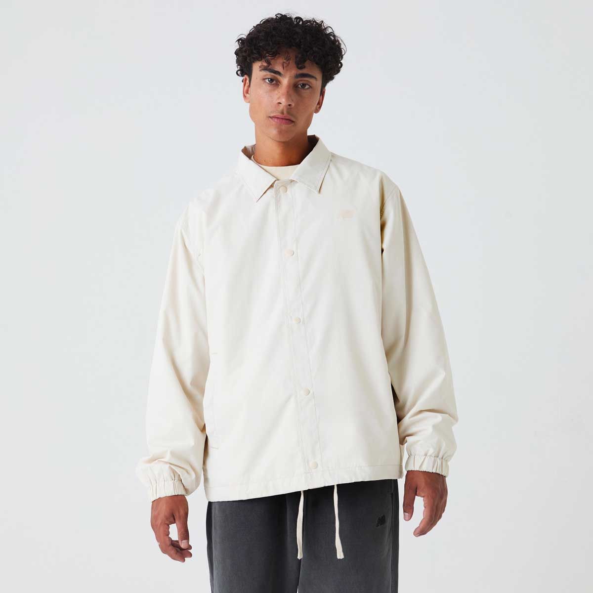 NEW BALANCE - Chaqueta Lifestyle Hombre New Balance Lightweight Coaches