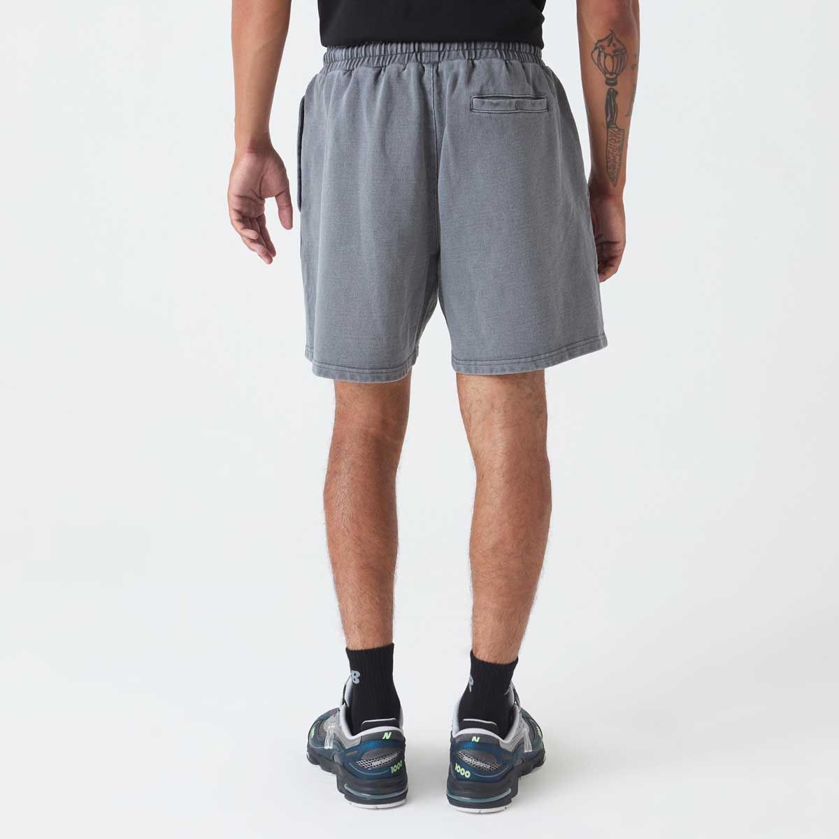 NEW BALANCE - Short Lifestyle Hombre New Balance Athletics Short 7" Gris