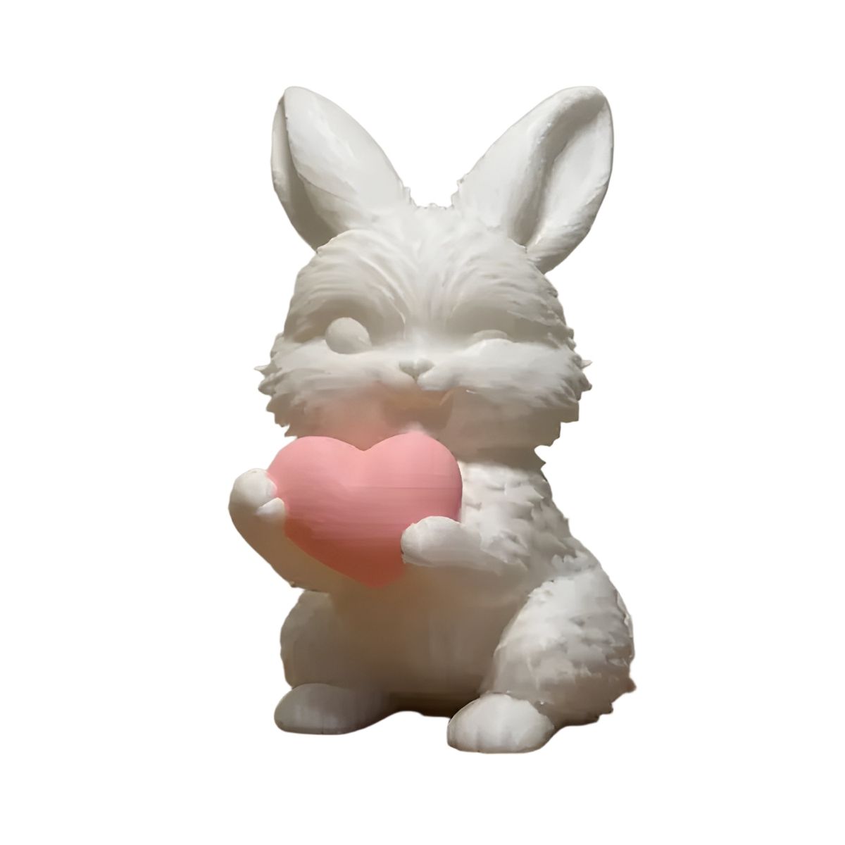 GENERICO - Escultura conejo de pascua con corazón blanco