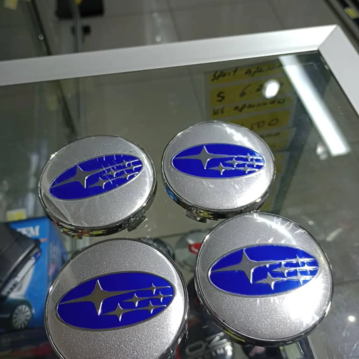 GENERICO - Set X4 Tapas centro de Llantas de autos 56mm universal subaru plata con azul