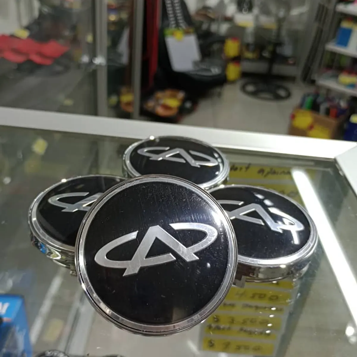 GENERICO - Set X4 Tapas centro de Llantas de autos 56mm universal chery borde plata