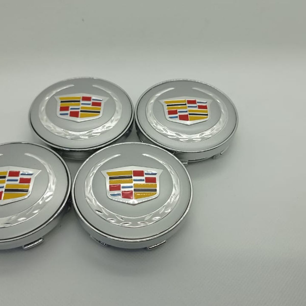 GENERICO - Set X4 Tapas centro de Llantas de autos 60mm universal cadillac plata