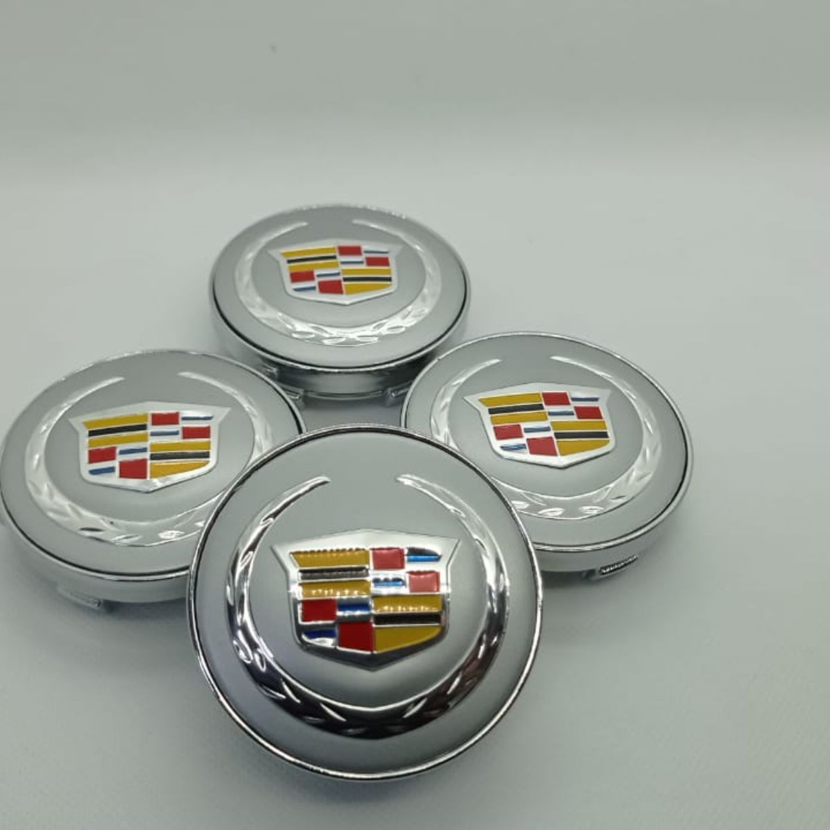 GENERICO - Set X4 Tapas centro de Llantas de autos 60mm universal cadillac plata