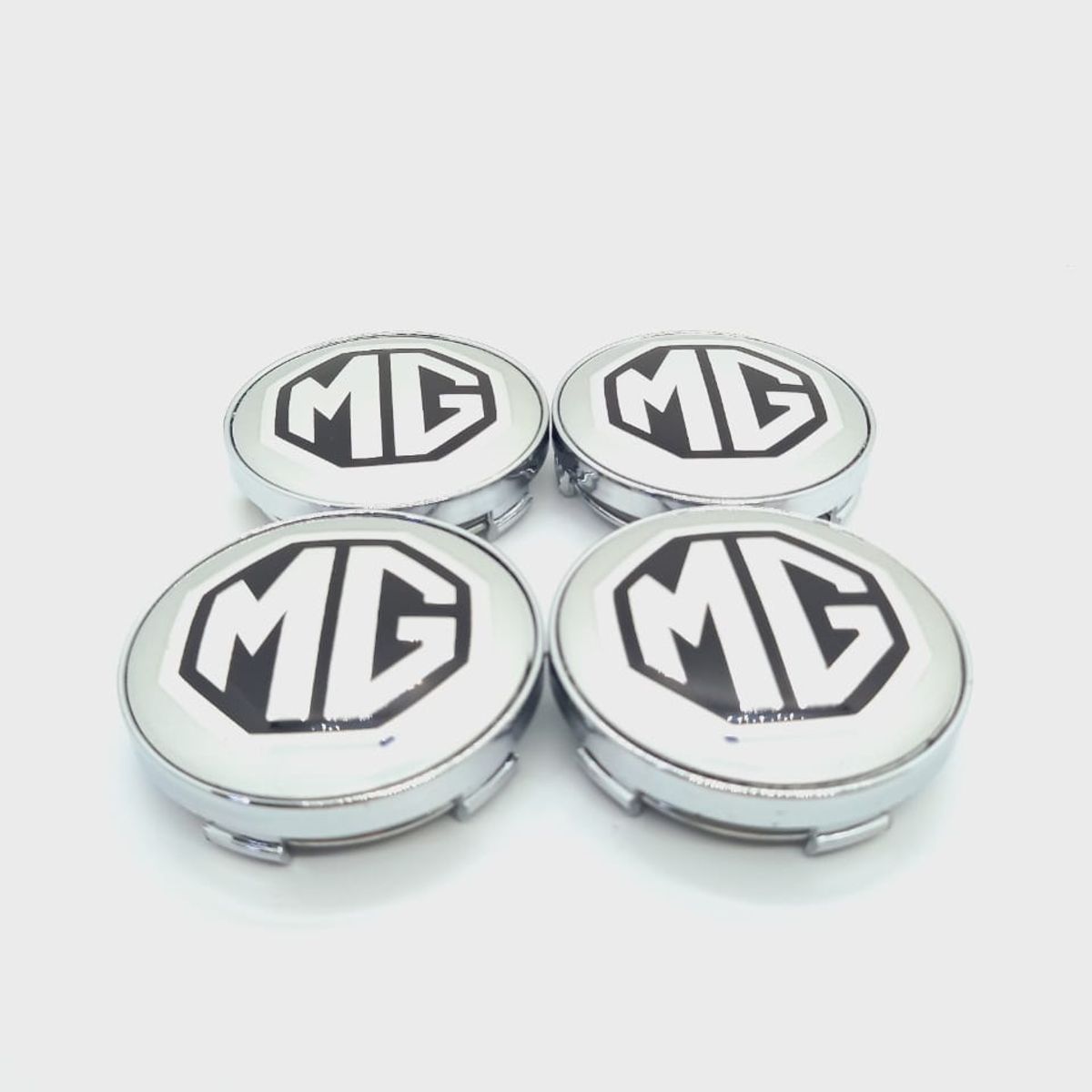GENERICO - Set X4 Tapas centro de Llantas de autos 56mm universal mg plata