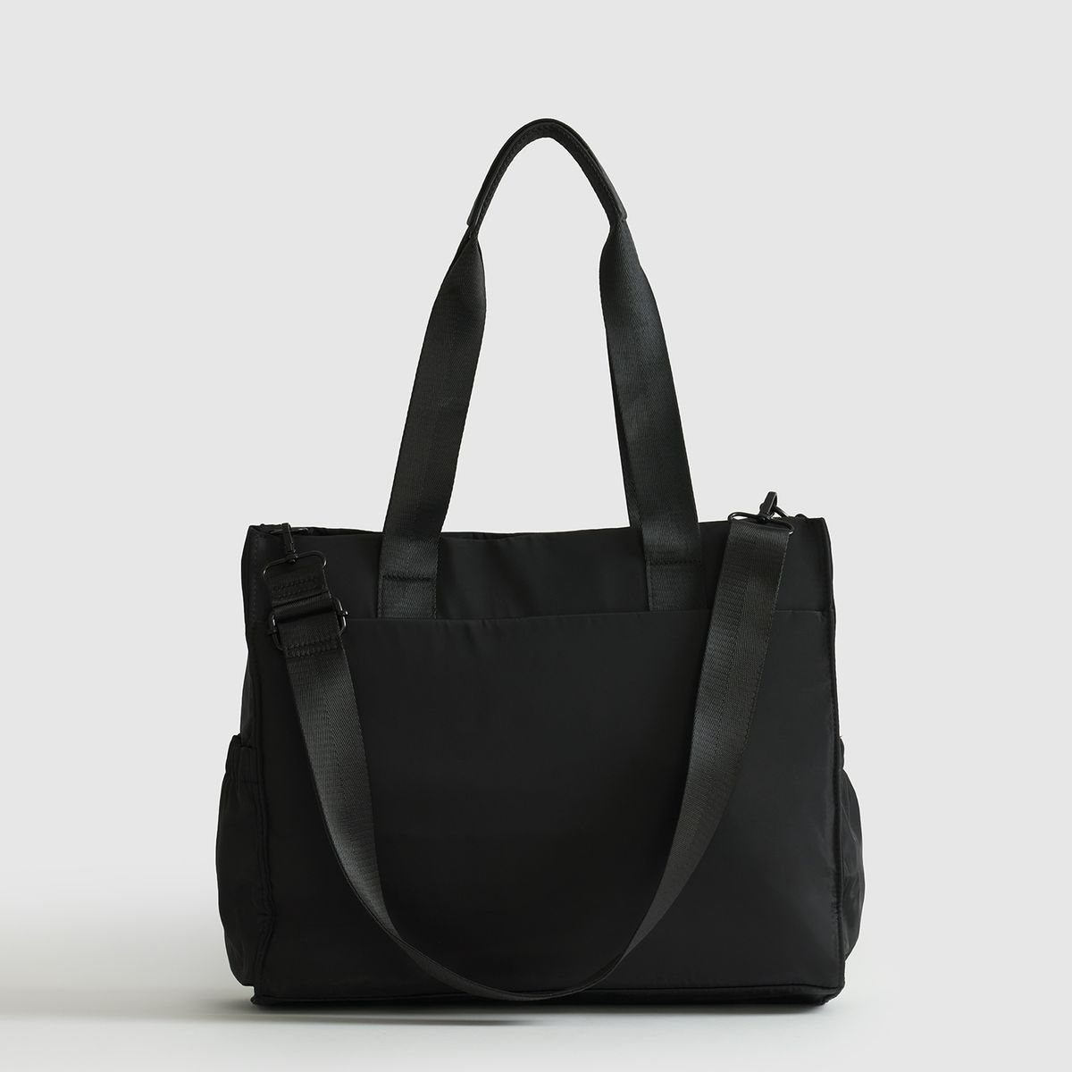 LOUNGE - Bolso Nylon Llavero Computador Icónica