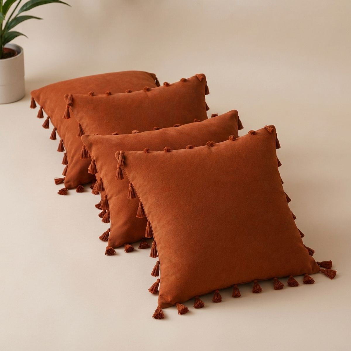 ARMONIA - Pack 4 Fundas De Cojín 45x45 cm Poliéster Café Con Borlas