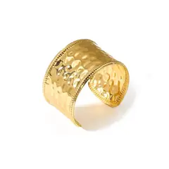 VANE COLLECTION - Pulsera esclava mujer ancha abierta dorada en acero con baño de oro y diseño machacado